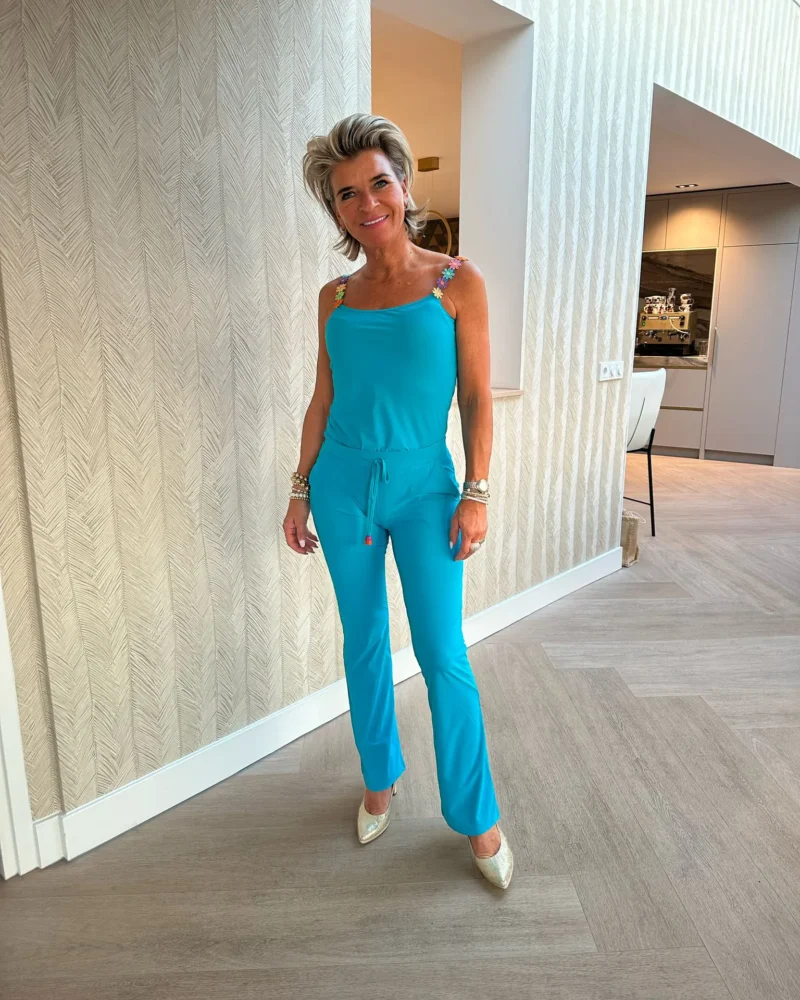Flared travelbroek bloemen | Aqua